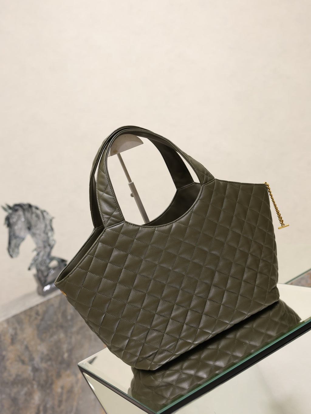 YSL quilted olive green tote bag with top handles and gold YSL charm
