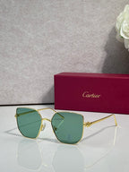 Rectangular sunglasses with gold frame and green mirrored lenses