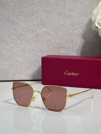 Rectangular sunglasses with gold frame and warm brown mirrored lenses