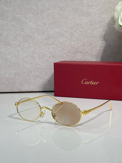 Cartier round metal glasses with gold frame and clear lenses