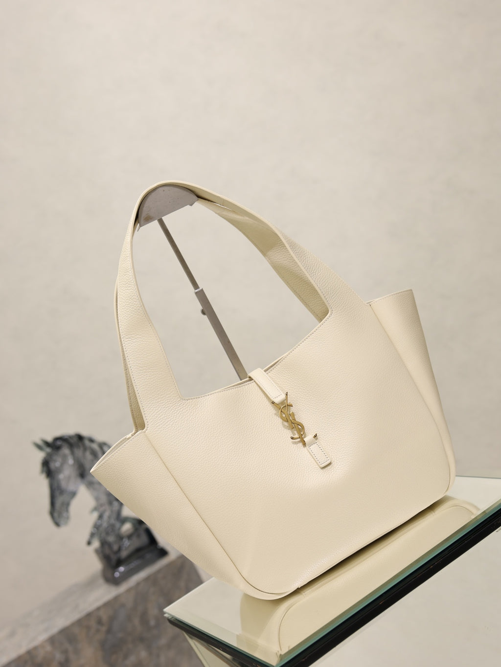 YSL cream tote bag, structured shape with gold emblem hardware