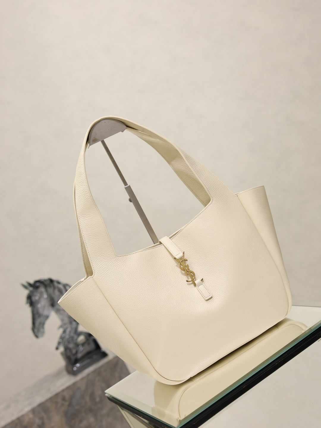 YSL cream tote bag, structured shape with gold emblem hardware