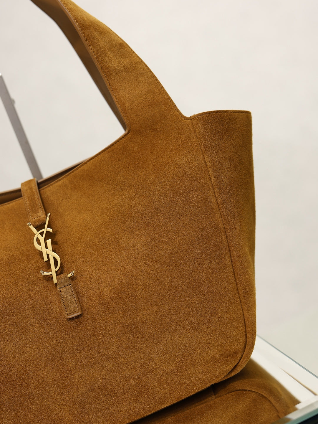 YSL suede tote bag in tan brown with YSL monogram charm on the side