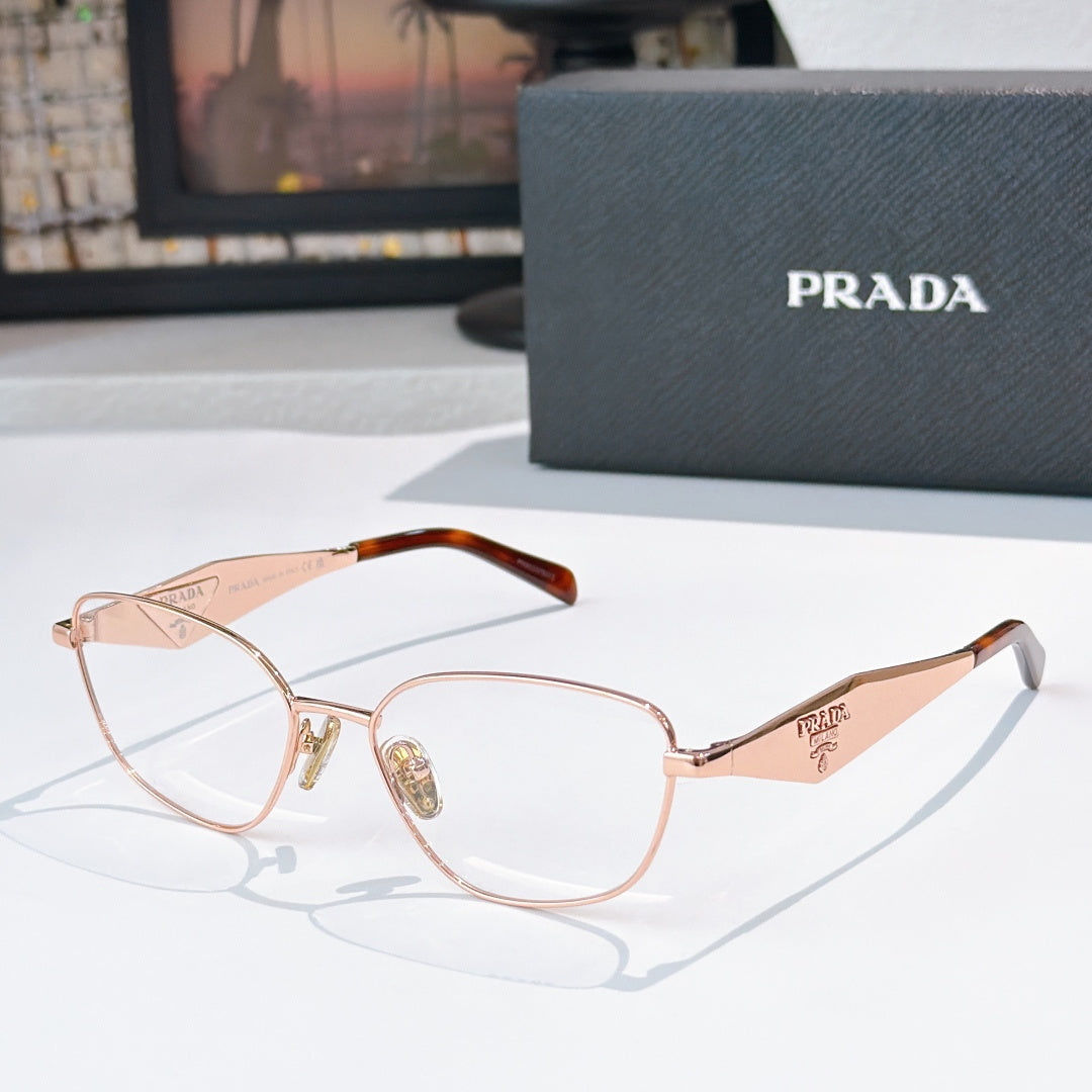 Prada eyeglasses with rose-gold metal frame and amber tortoise temple tips