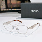 Prada eyeglasses with silver metal frame and amber tortoise temple tips