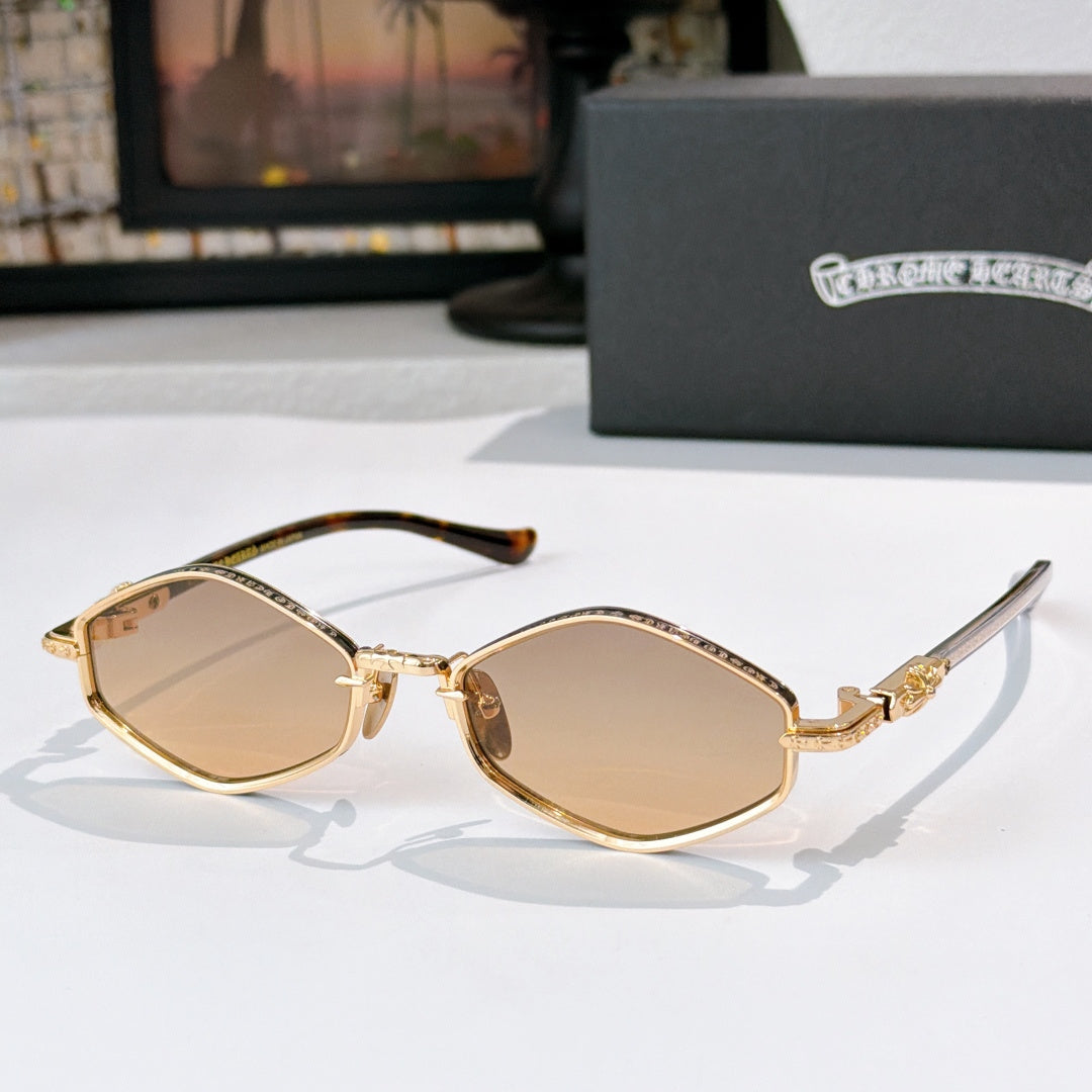 Chrome sunglasses with tan lenses, gold-tone metal frame, and curved temples.