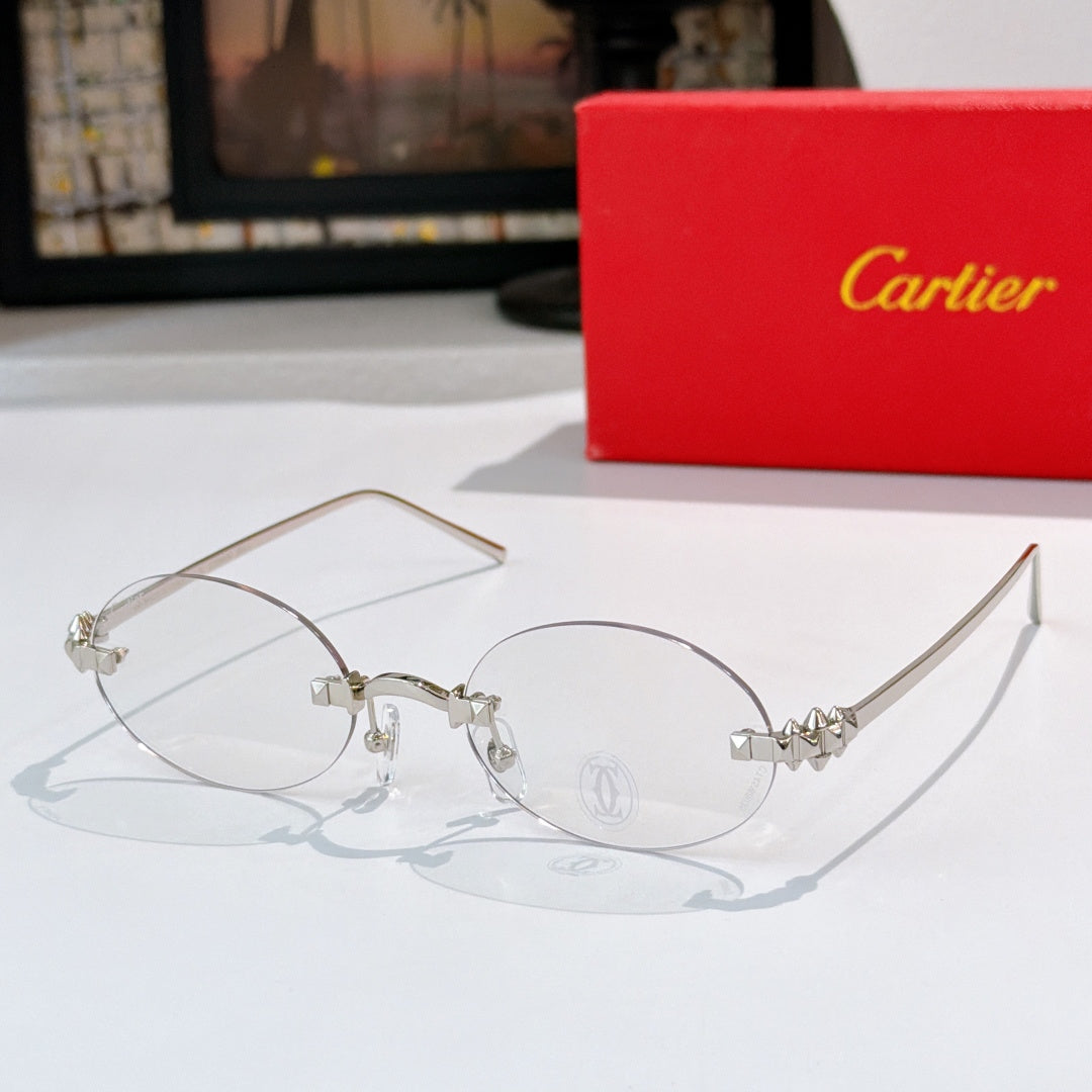 Cartier sunglasses with silver round frames and clear lenses