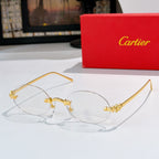 Cartier sunglasses with gold round frames and clear lenses