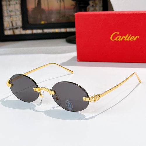 Cartier sunglasses with gold round frames and dark gray tinted lenses