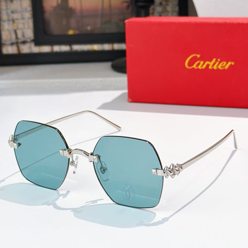 Cartier sunglasses with blue tinted lenses and thin silver frame, gold temple details