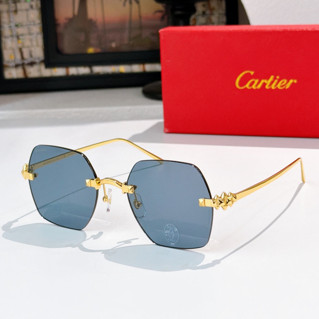 Cartier sunglasses with blue tinted lenses and gold frame, metal temple link details