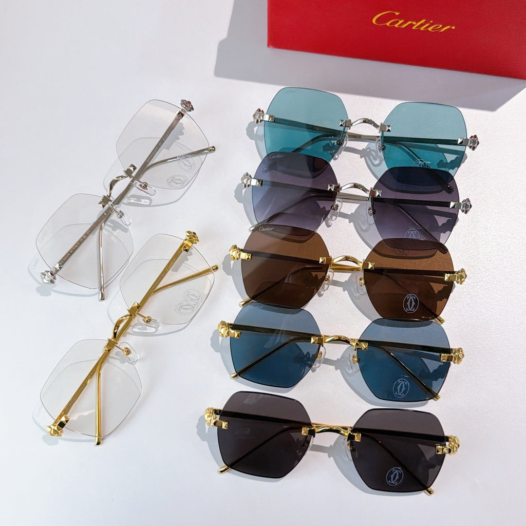 Cartier sunglasses set with mixed clear and tinted lenses, gold and silver metal frames