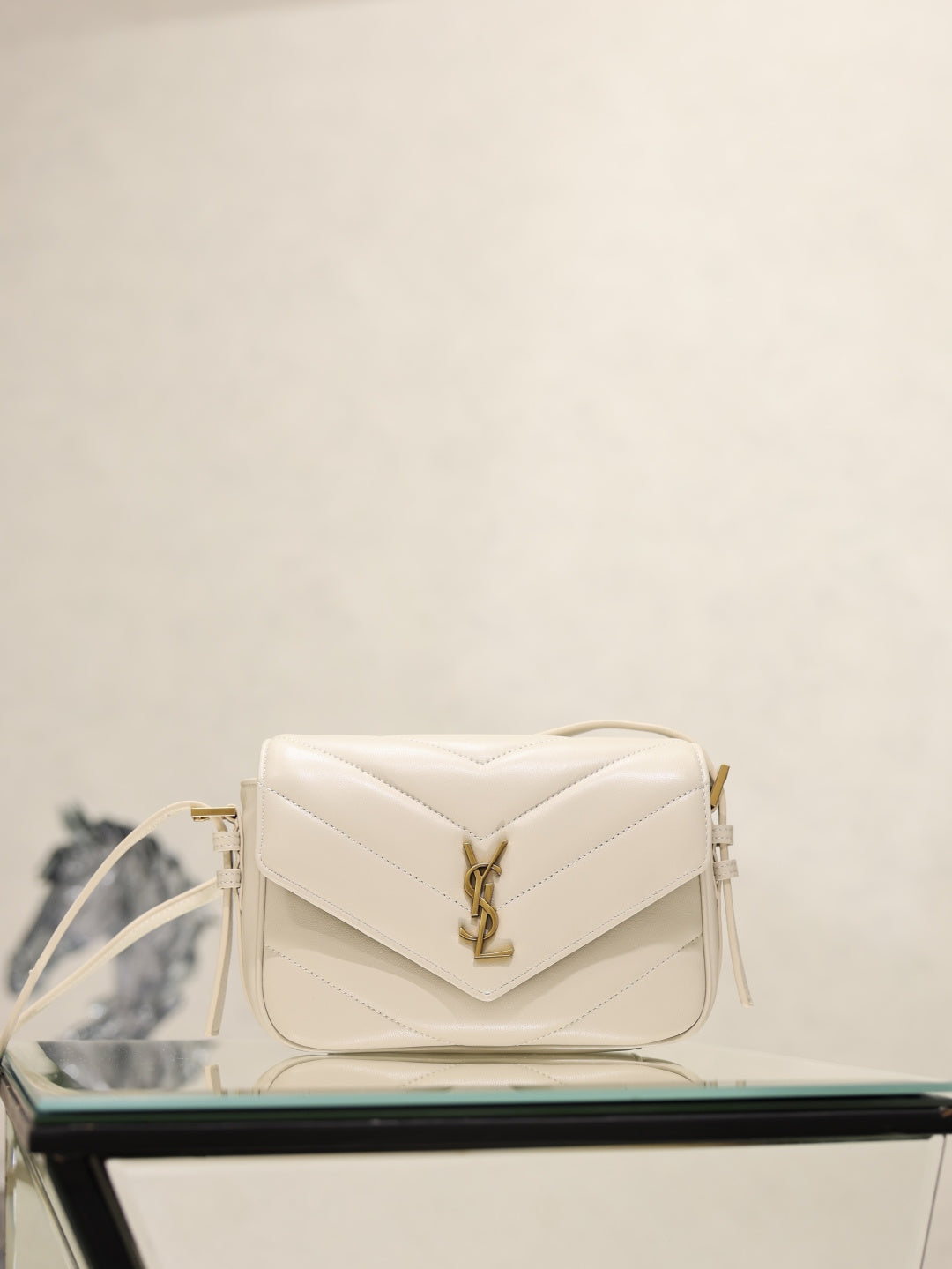 Cream quilted YSL shoulder bag with front flap and gold YSL logo