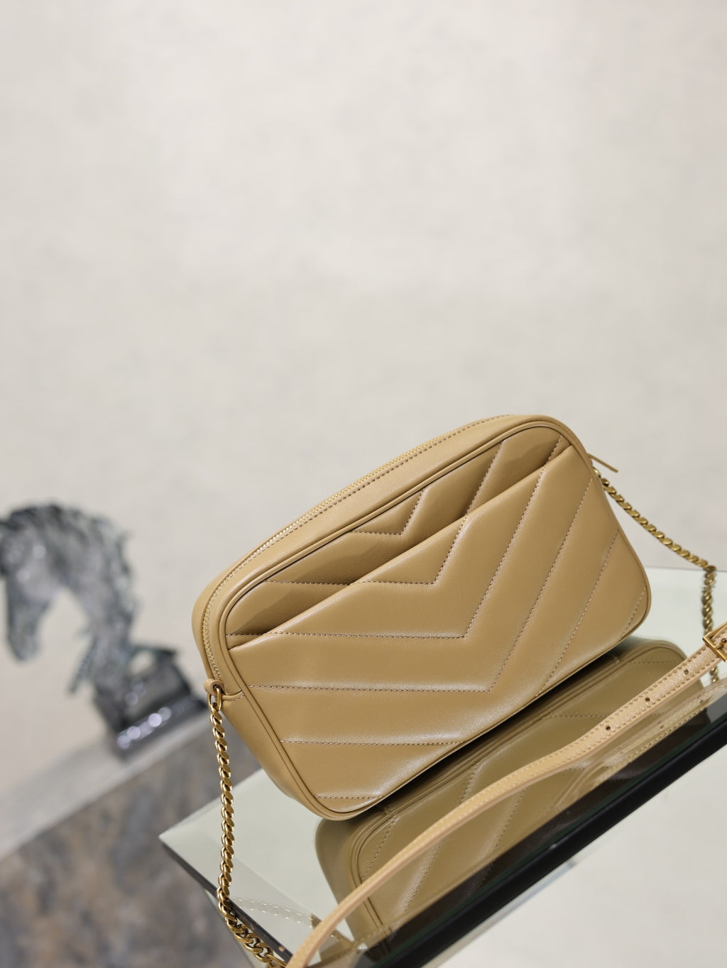 Quilted leather mini shoulder bag with YSL logo clasp and chain strap, light tan