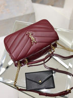 Burgundy quilted shoulder bag with gold YSL logo on flap, chain strap.