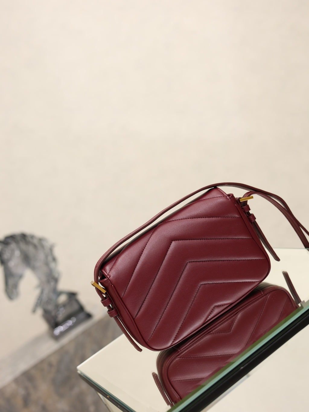 YSL quilted leather crossbody bag in burgundy, YSL monogram and shoulder strap