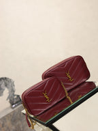 YSL quilted shoulder bag with YSL monogram and gold chain, burgundy