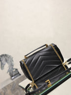 Black quilted shoulder bag with YSL logo and gold chain detail