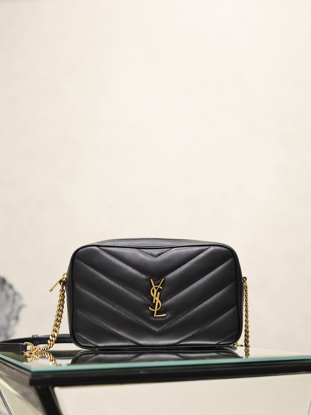 YSL quilted shoulder bag, black leather with gold YSL logo and chain strap