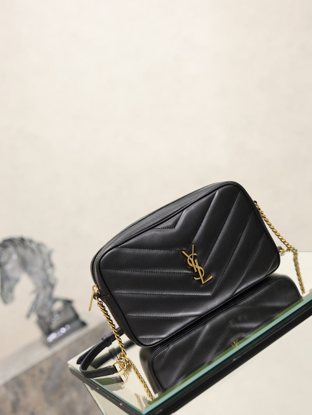 YSL quilted shoulder bag with chain strap, black leather and gold YSL logo