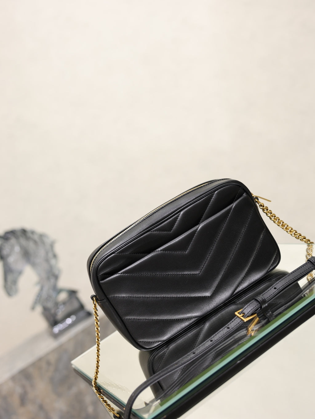 YSL quilted shoulder bag, black leather with gold YSL logo and chain strap