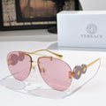 Metal-framed sunglasses with pink mirrored lenses and gold-tone temples