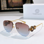 Metal-framed sunglasses with rose-pink mirrored lenses and gold-tone temples