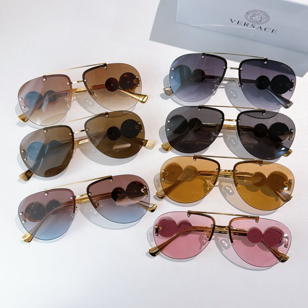 Assorted metal-framed sunglasses with tinted lenses in multiple colors