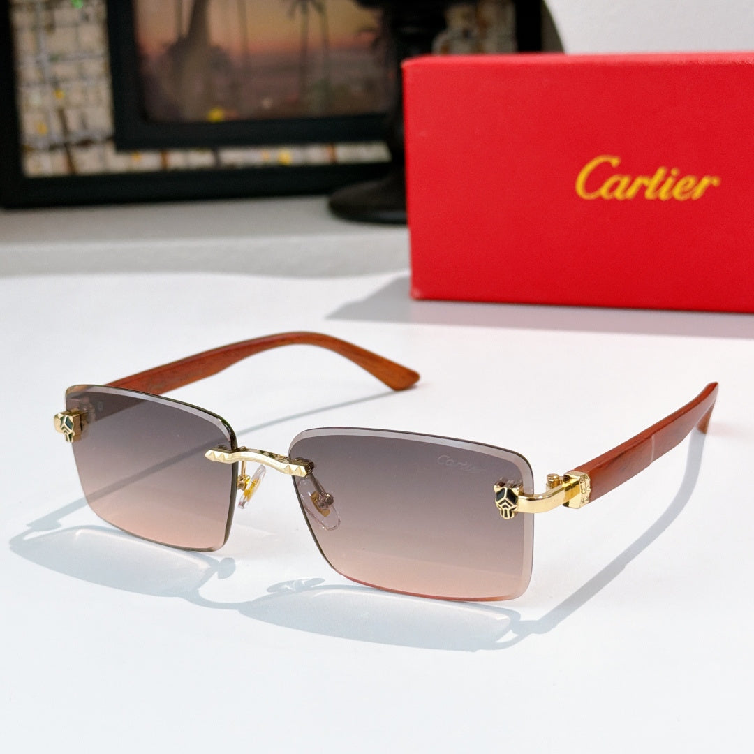 Sunglasses with taupe lenses, warm brown frame, gold hinges
