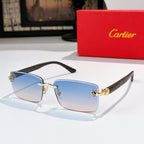 Sunglasses with light blue lenses, dark frame, gold hinges and bridge
