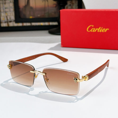 Sunglasses with brown-tinted lenses, warm brown frame, gold hinges