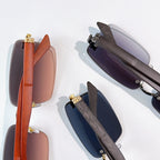 Sunglasses with brown and blue lenses, wood-effect temples, gold hardware