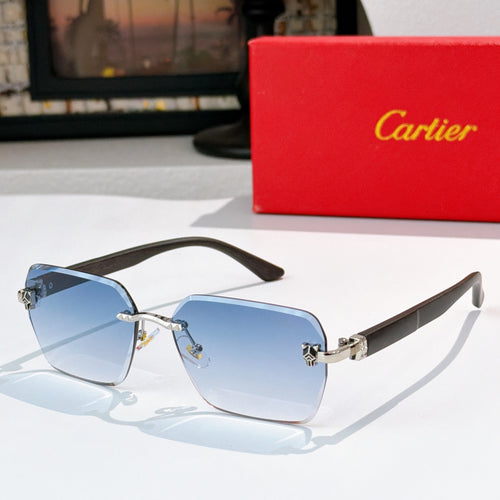 Cartier sunglasses with dark frame and light blue gradient lenses