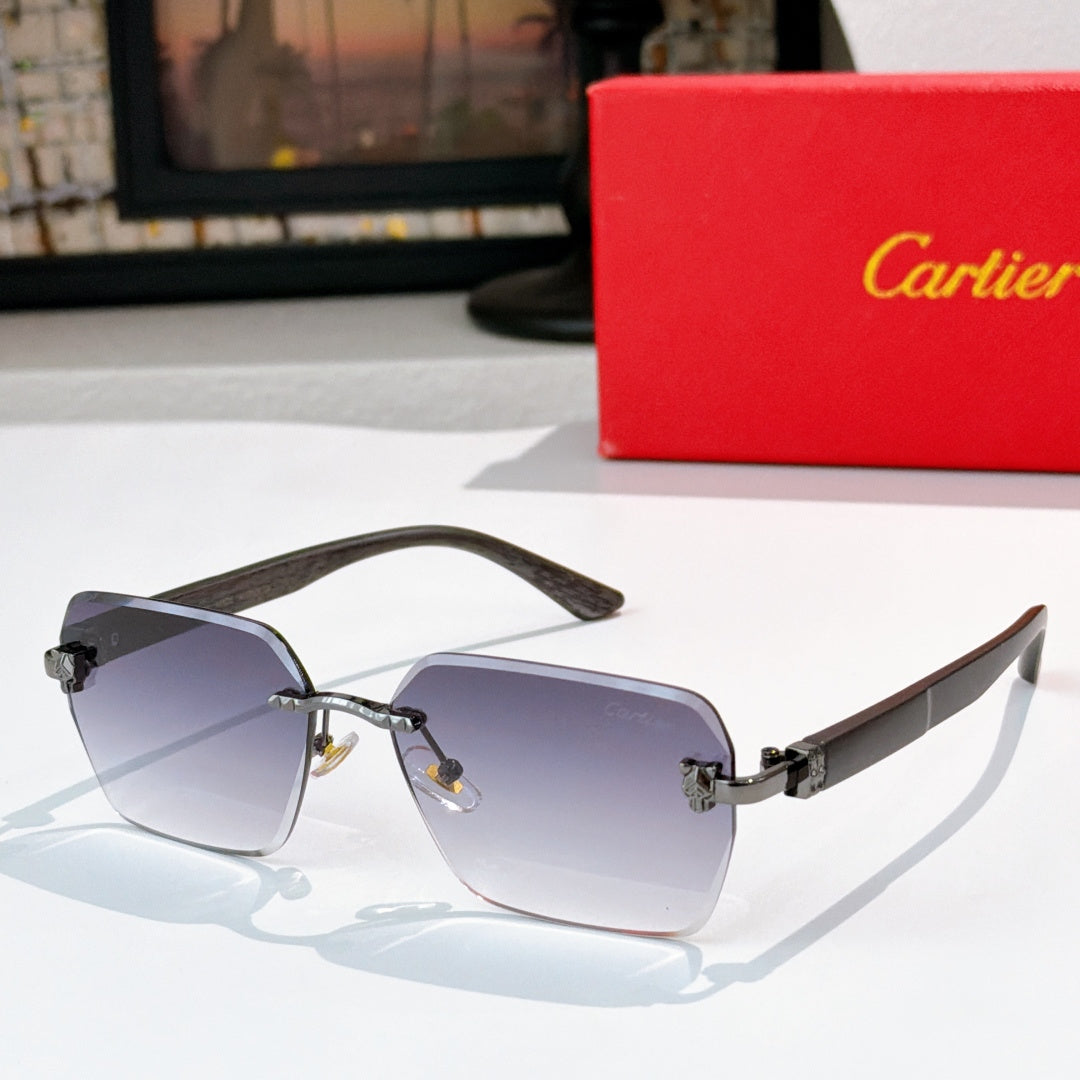 Cartier sunglasses with dark frame and blue gradient lenses