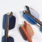 Cartier sunglasses assortment with wood-tone frames and blue and brown lenses