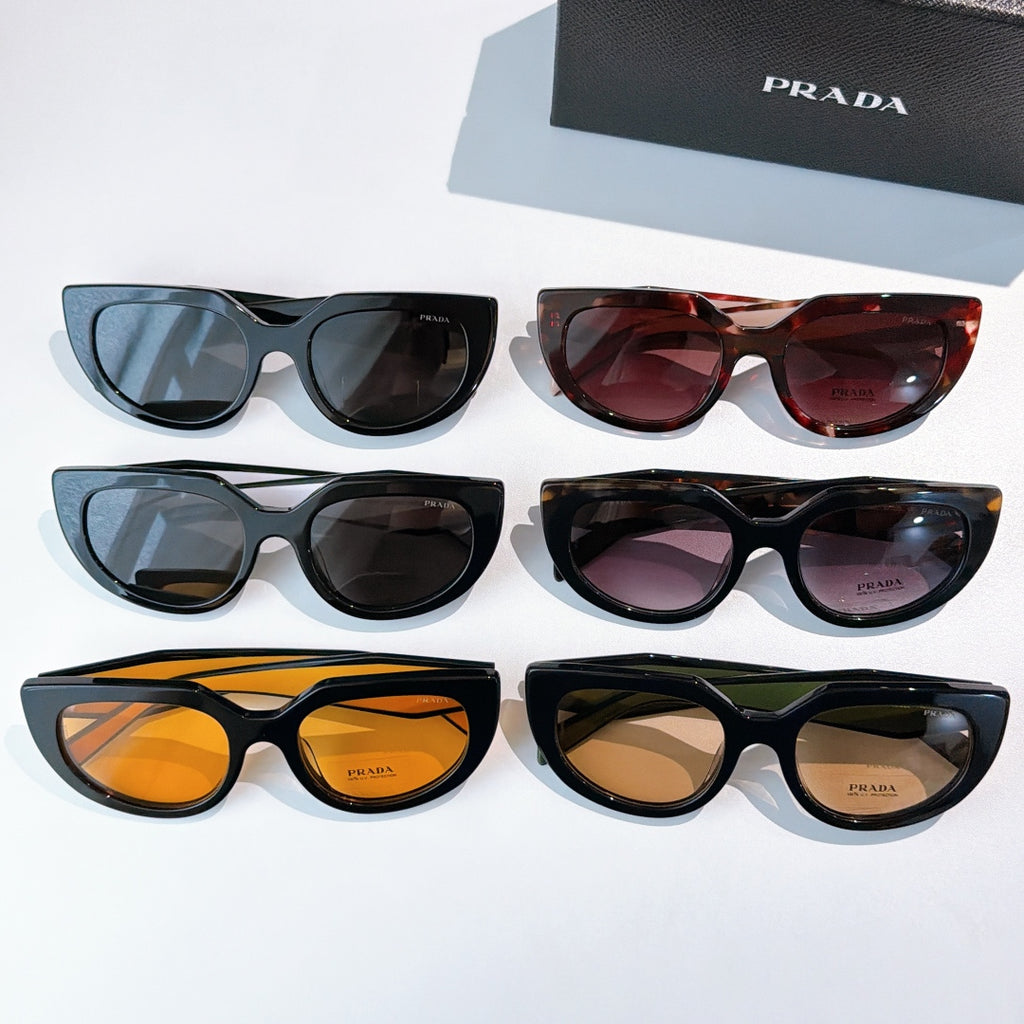 Prada sunglasses collection with multiple frames and tinted lenses