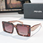 Prada square sunglasses with dark tortoiseshell frame and pink lenses