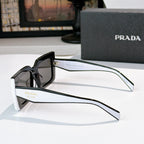 Prada rectangular sunglasses side view with black frame and tinted lens