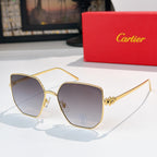 Designer glasses with gold-tone frames and gray tinted lenses