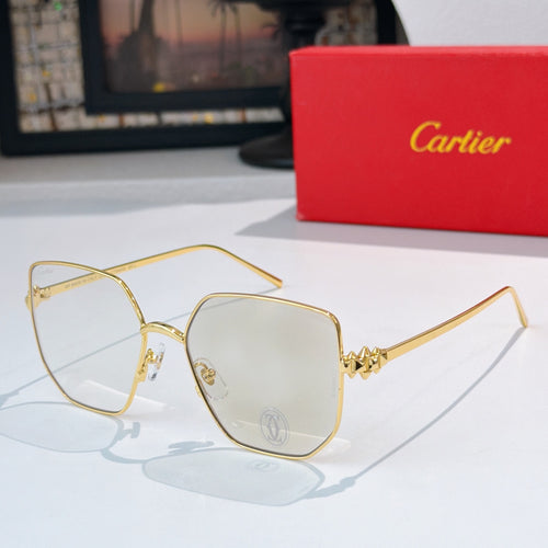Cartier glasses with gold-tone frames and clear lenses, butterfly-shaped design