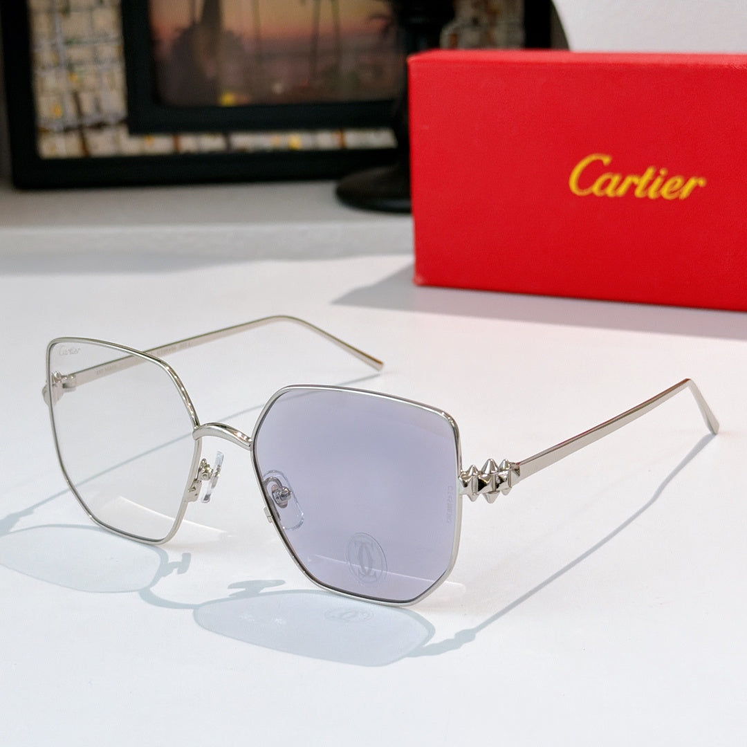Designer glasses with silver-tone frames and light purple tinted lenses
