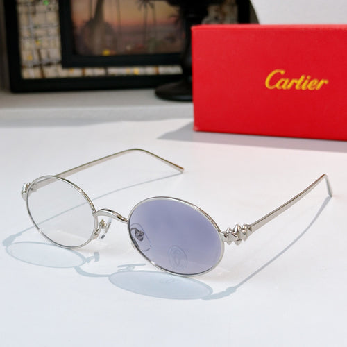 Cartier glasses: gold round frames with blue-tinted lenses