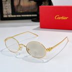 Cartier glasses: gold round frames with clear lenses