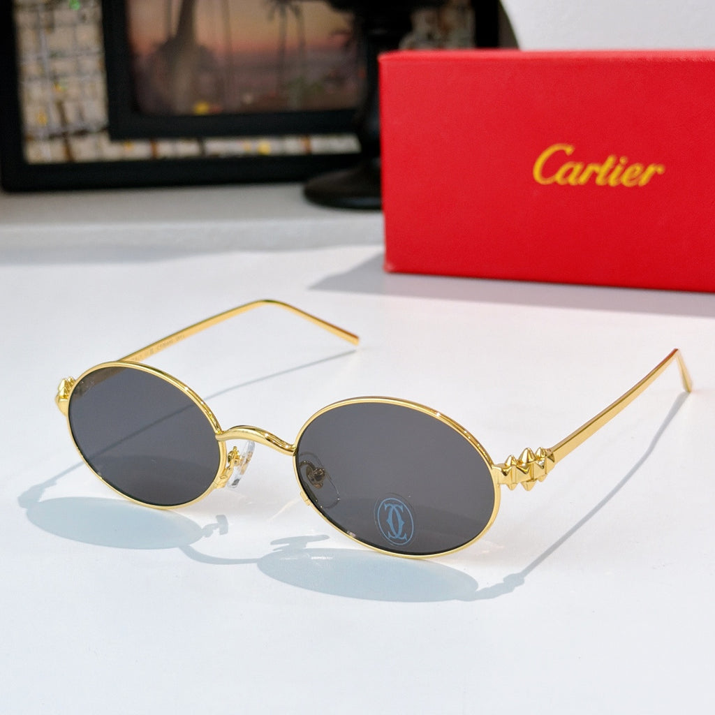 Cartier glasses: gold round frames with charcoal-tinted lenses