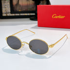 Cartier glasses: gold round frames with charcoal-tinted lenses