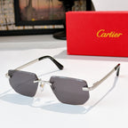 Cartier glasses with gold-trimmed black frame and dark lenses