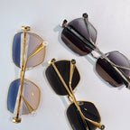 Chanel sunglasses set with mixed gold and black frames, tinted lenses (4 pairs shown)