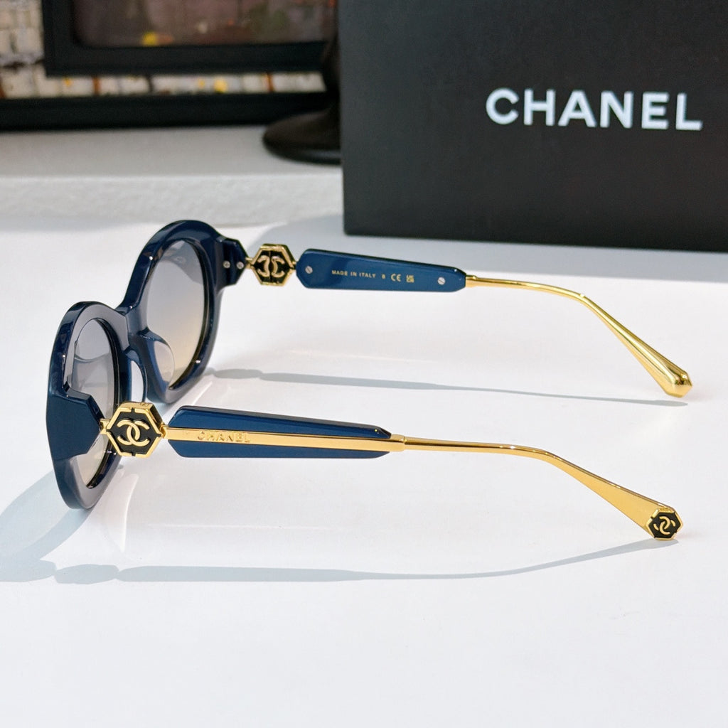 Chanel round sunglasses with blue frames and gold-toned arms