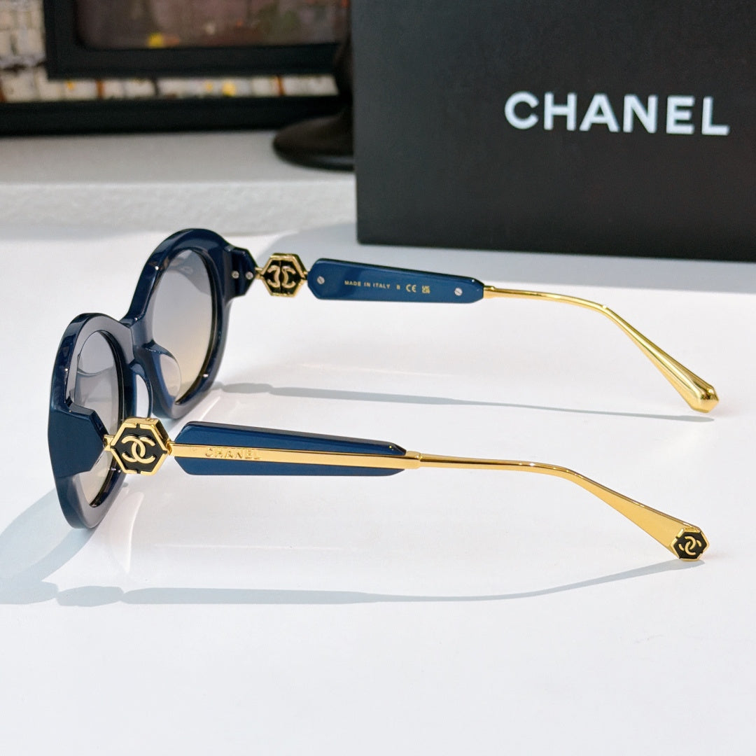 Chanel round sunglasses with blue frames and gold-toned arms