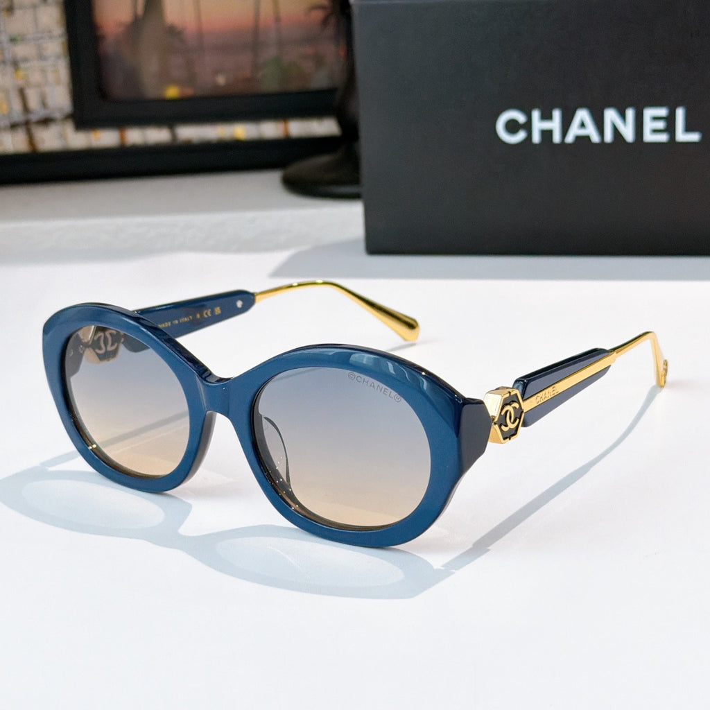 Chanel blue sunglasses with round frames and light tan-tinted lenses